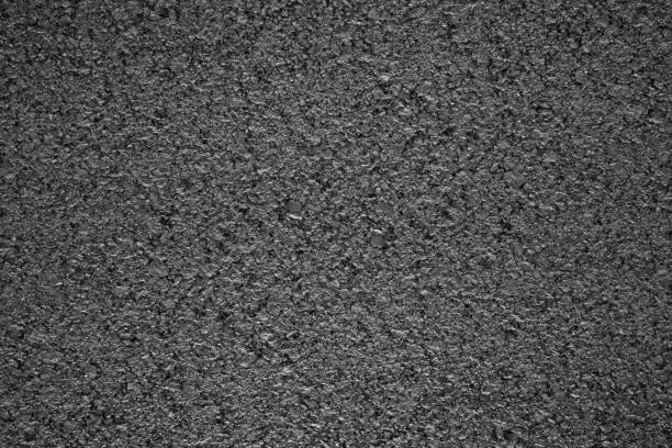 istock Asphalt background texture with some fine grain with road 879535094