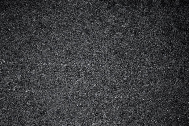 istock Asphalt background texture with some fine grain with road 879535288