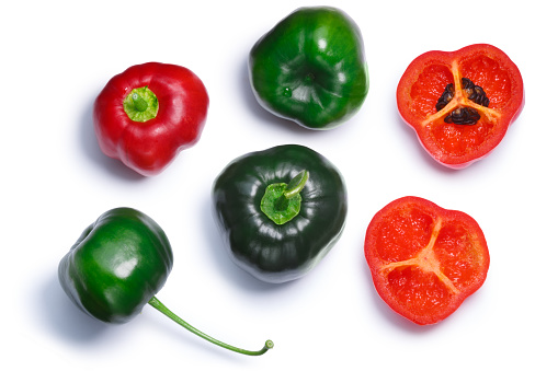 Manzano chile peppers Rocoto (Capsicum pubescens fruit), green, red,split. Clipping path, shadow separated