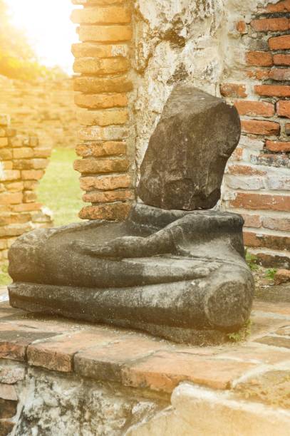 istock old broken Buddha statue at Chaiwatthanaram Temple, Ayutthaya, Thailand 879550390