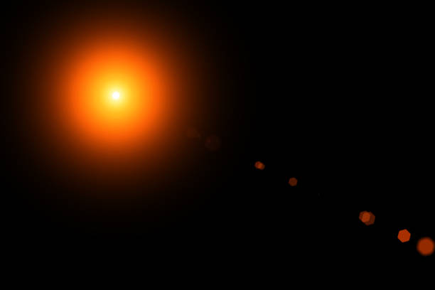 istock digital lens flare,sun burst on black background 879557106