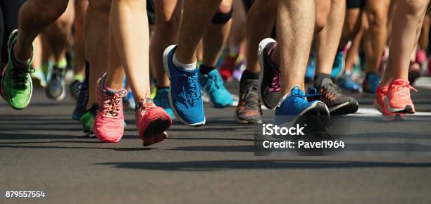 Marathon Runners Running On City Road Stock Photo - Download Image Now - Running, Foot, Marathon