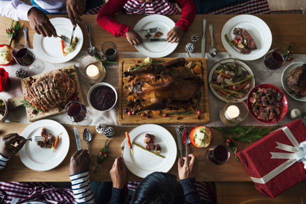 istock Family having a Christmas dinner 879570546