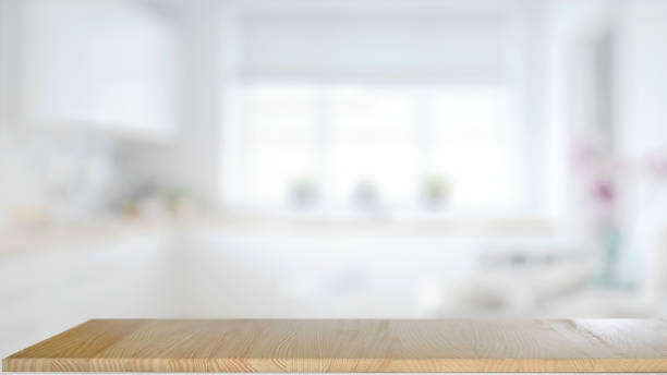 istock Smart Display Concept. Empty  wood table counter in modern kitchen room. for product montage display. 879573520