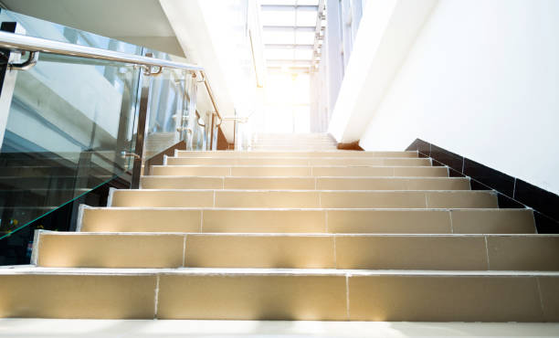 istock Marble staircase and glass railings 879594518