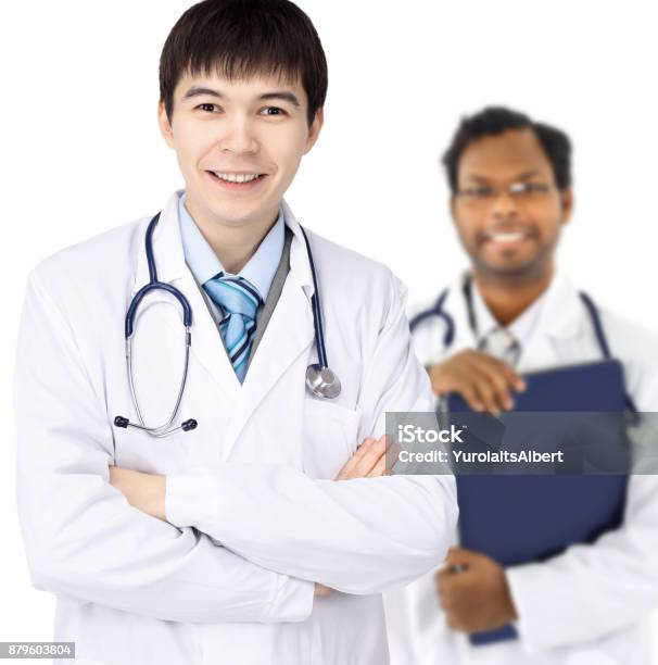 The Doctor And Intern On A White Background Stock Photo - Download Image Now - Achievement, Adult, Adults Only