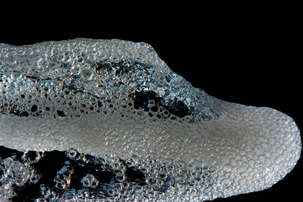 istock abstract shape of water, splashing on black background. Dreamlike vision and immagination. 879608236