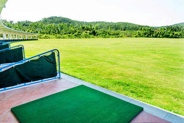 Empty golf driving range Empty golf driving range golf free bet site stock pictures, royalty-free photos & images