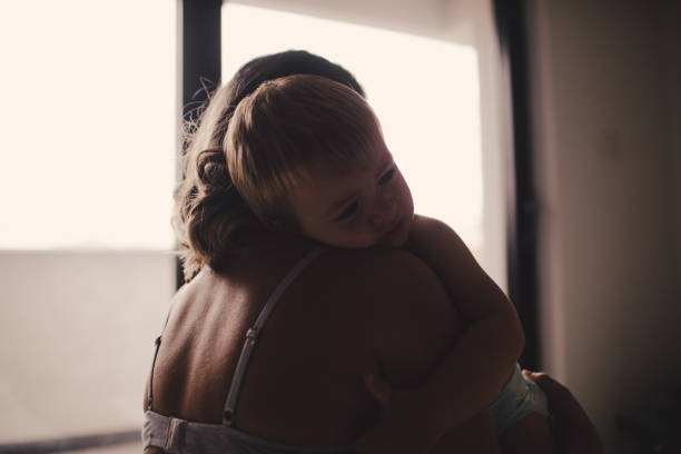 istock Mom comforting her little boy 879631384