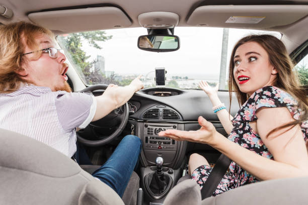 istock Couple arguing in car 879638240