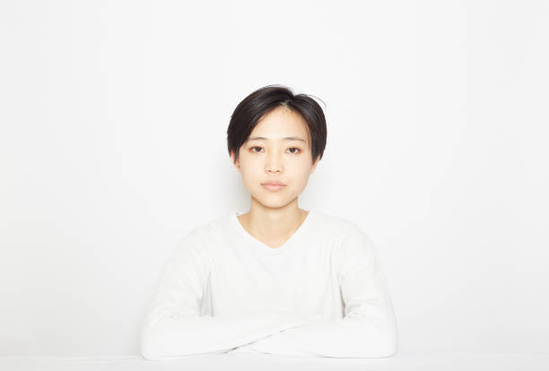 girl 、ホワイト - 無表情 ストックフォトと画像