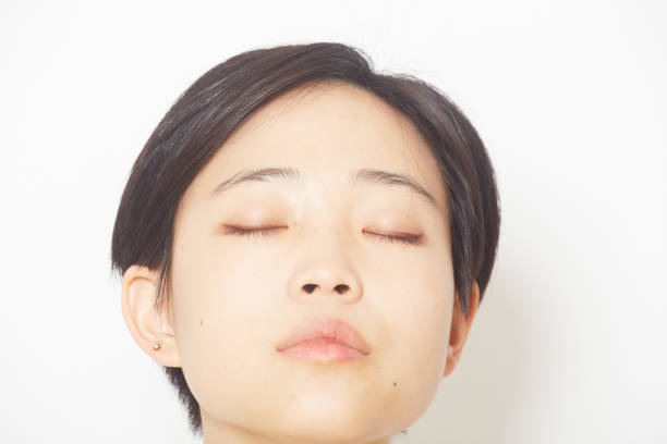 istock a closeup studio shot photo of a young wowan's face 879645638