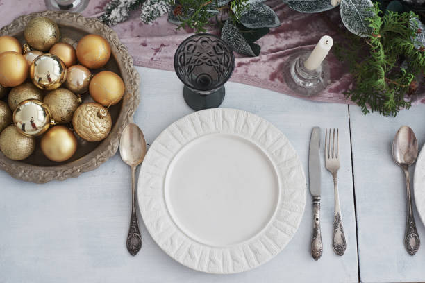 istock Table served for Christmas dinner in living room, top view 879652048