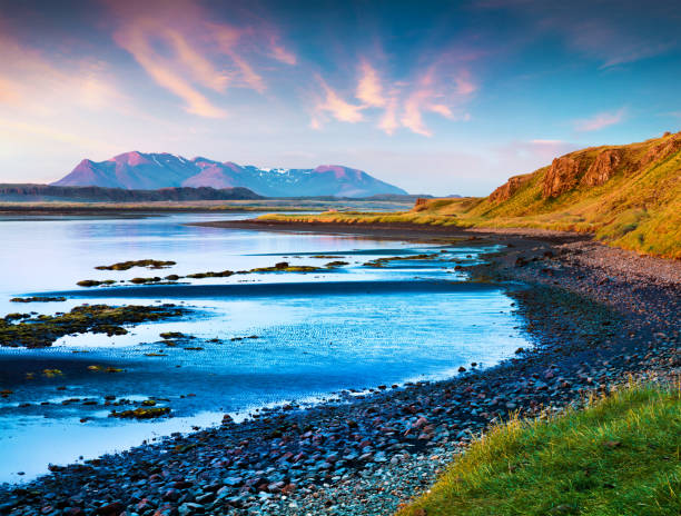 istock Typical Icelandic landscape with volcanic mountains and Atlantic ocean coast 879656442