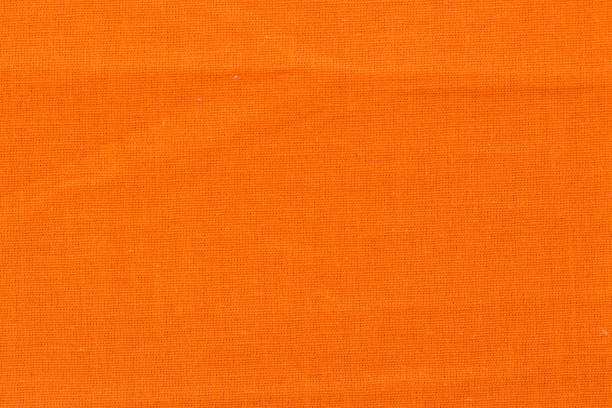 текстура оранжевой ткани для фона - art fiber pattern textured effect стоковые фото и изображения