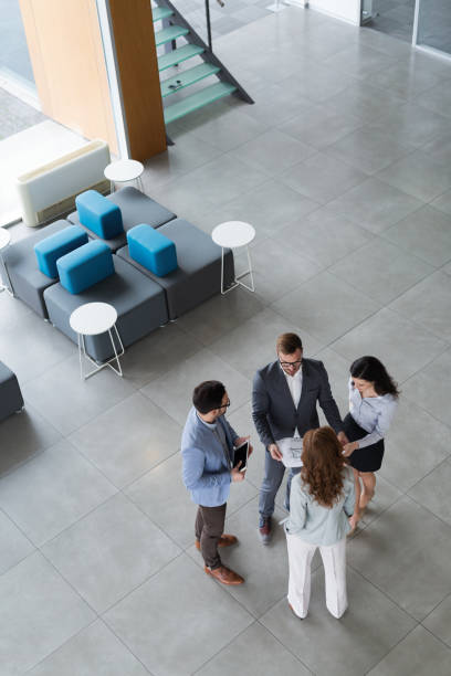 istock Group of business people collaborating and working on project 879662070