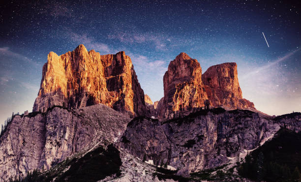 istock Rocky Mountains at Fantastic starry sky. Dolomite Alps, Italy 879689902