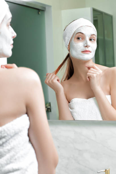 istock woman with a mask on her face 879695812