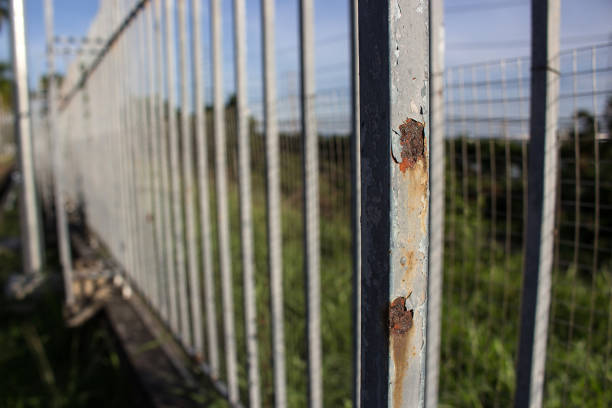 istock rusty and damaged metal background 879696188