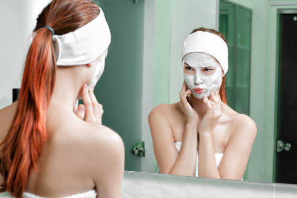 istock woman with a mask on her face 879696216