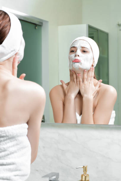 istock woman with a mask on her face 879696738