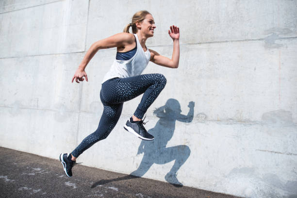 istock Woman running outdoors 879706684