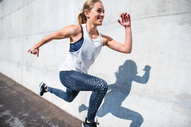 istock Woman running outdoors 879708904
