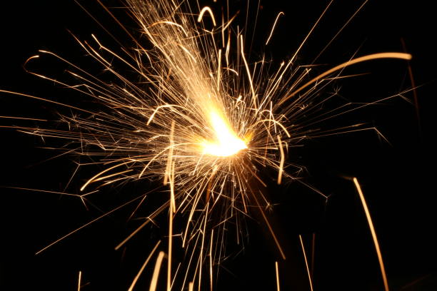 istock sparkler or bengal light burning over black 879709050