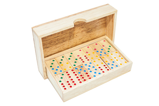 domino game tiles in wooden case box. Isolated on white background,clipping path