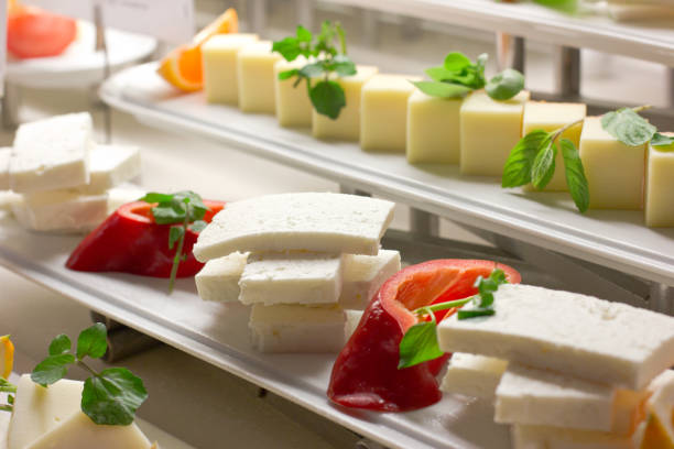 istock White cheese with the fresh herbs and red sweet pepper 879735726