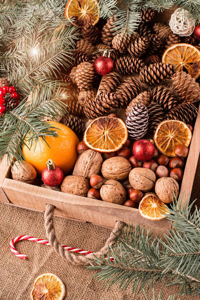 istock Box with Christmas decoration, nuts, cones 879743998