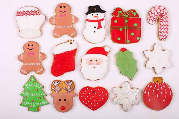 istock Christmas homemade gingerbread cookie frame on wooden table top view with copy space 879746318