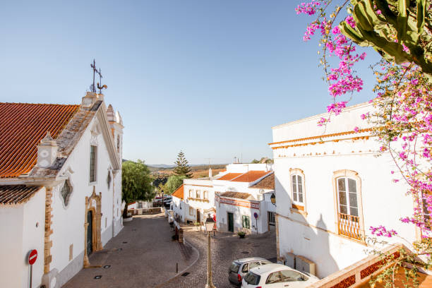 Alte village on the south of Portugal Typical village with white old church during the sunrise on the south of Portugal alte algarve stock pictures, royalty-free photos & images