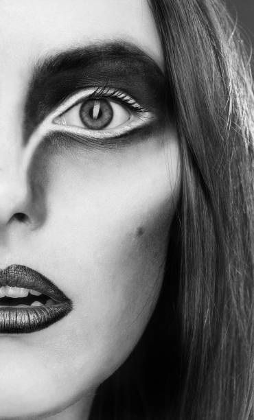 istock Woman with raven make up portrait. 879751638