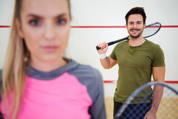 istock Squash or tennis player on court 879754394
