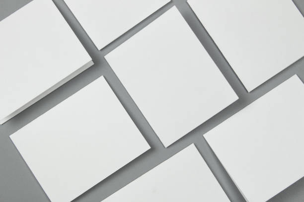 istock Blank portrait mock-up paper. brochure magazine isolated on gray, changeable background / white paper isolated on gray 879760114