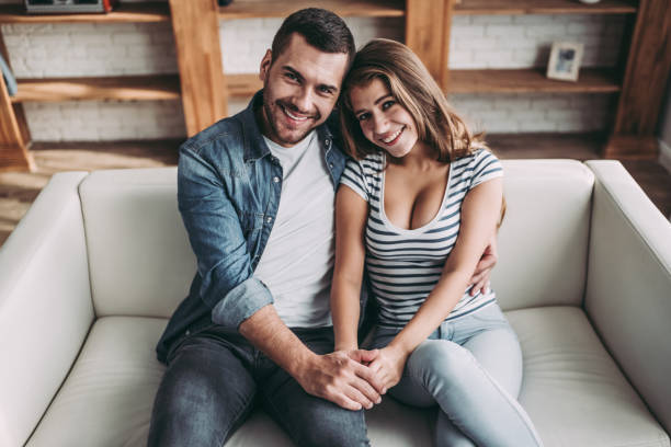 istock Happy couple is sitting. 879762744