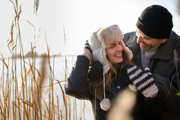 istock Love couple enjoying their day out during winter 879763236