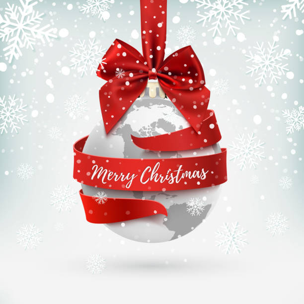 istock Merry Christmas, earth icon with red bow and ribbon around. 879763526