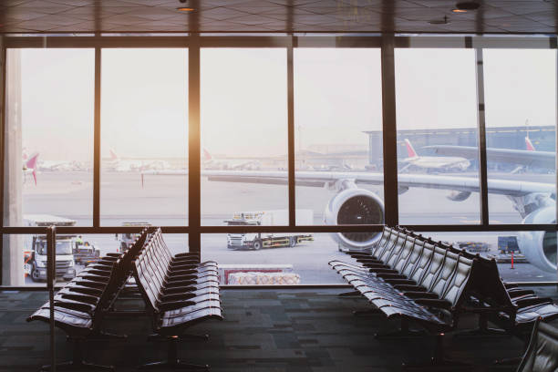 istock modern airport terminal with big window 879783960