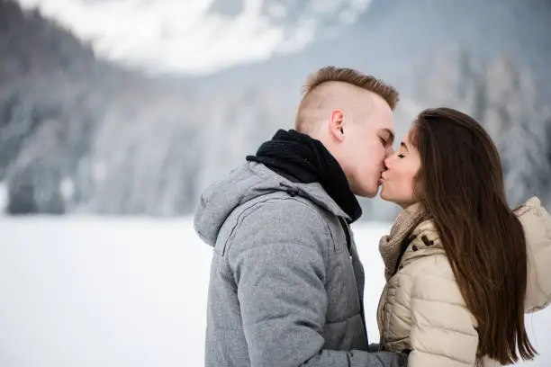 Young couple in love kissing each other