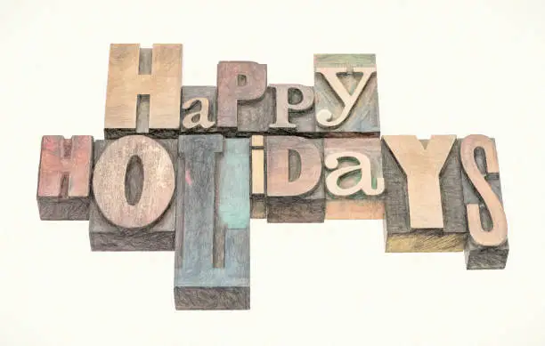 Happy Holidays greeting card  in mixed letterpress wood type printing blocks, digital painting effect applied to a photograph
