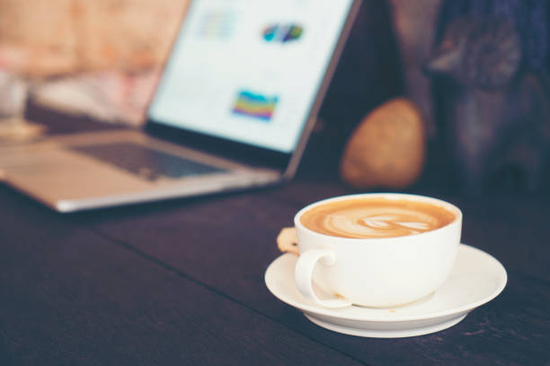 istock coffee latte art with tablet, working in the cafe 879801500