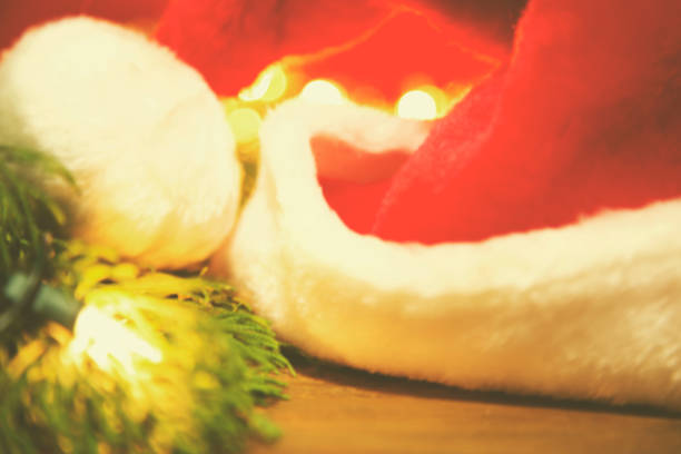 istock Merry Christmas holiday decorations, santa hat. 879805364
