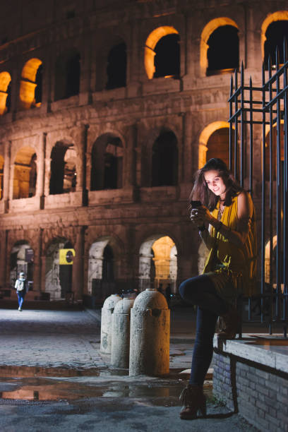 istock Smiling girl with phone 879809474