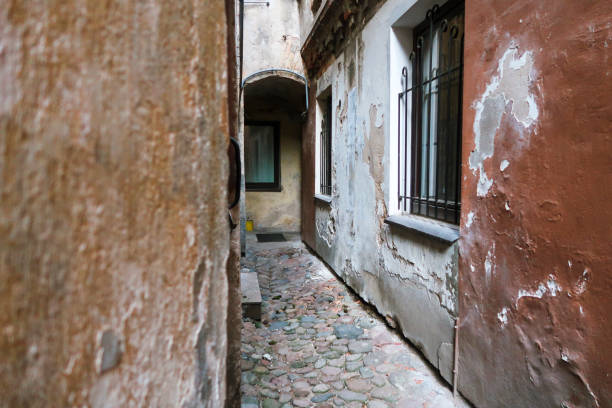 istock a narrow courtyard in a European town 879809626