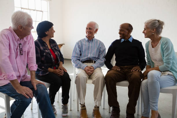 istock Friends talking during discussion in art class 879819124