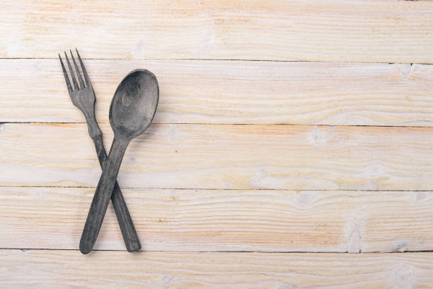 istock Old cutlery. On a wooden background. Top view. Free space for text. 879828050