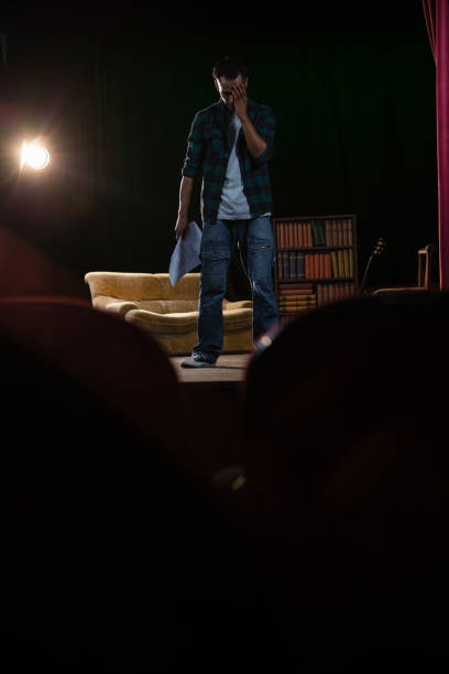 istock Artist rehearsing on stage 879828530