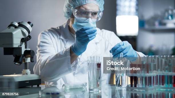 Laboratory Worker Measuring Exact Formula For Hypoallergenic Cosmetic Products Stock Photo - Download Image Now